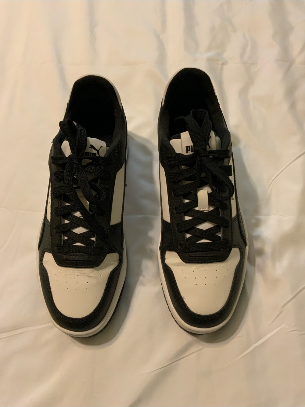 Puma Women’s Caven Black and White Low-Top Sneakers